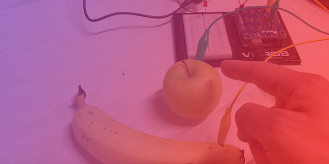 Capacitive touch experiment: A banana and an apple used as capacitive touch sensors