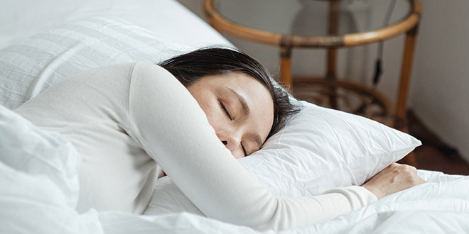Young woman having improved her sleep quality