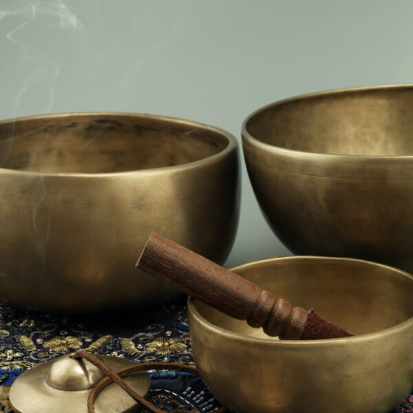 bowls-tingsha Photo of three singing bowls and tingsha, Tibetan meditation bells. I integrate mindfulness meditation as part of my creativity coaching.